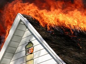 A fire on the roof of a house