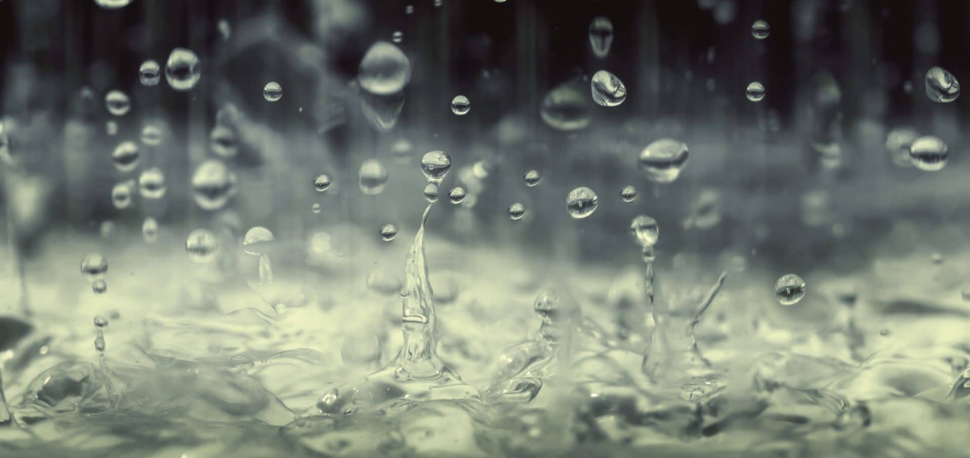 Pool of water and fallilng droplets