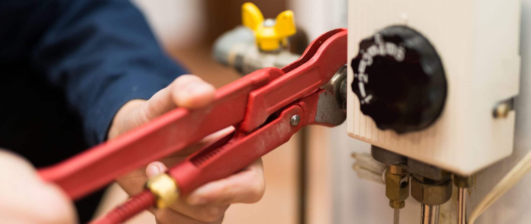 Man working on a water heater