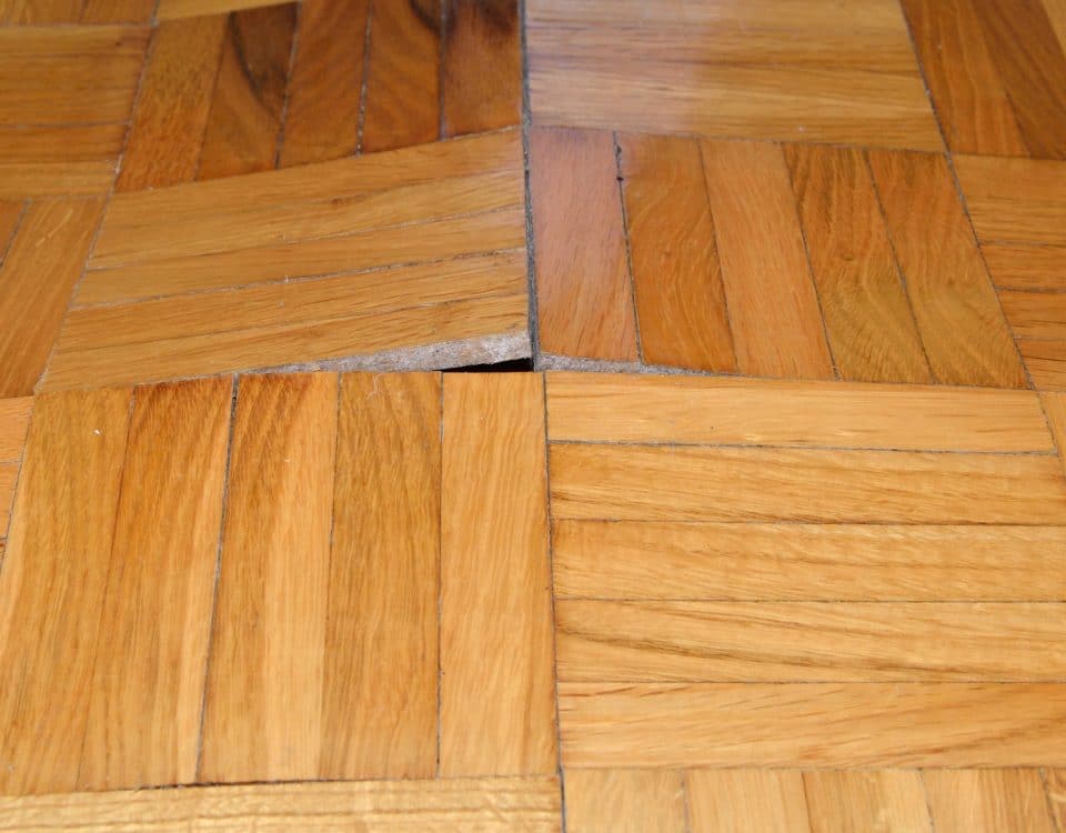 Wood floor warped by water damage