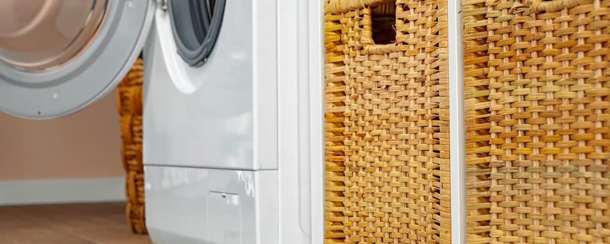 Washer and baskets in a laundry room