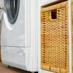 Washer and baskets in a laundry room
